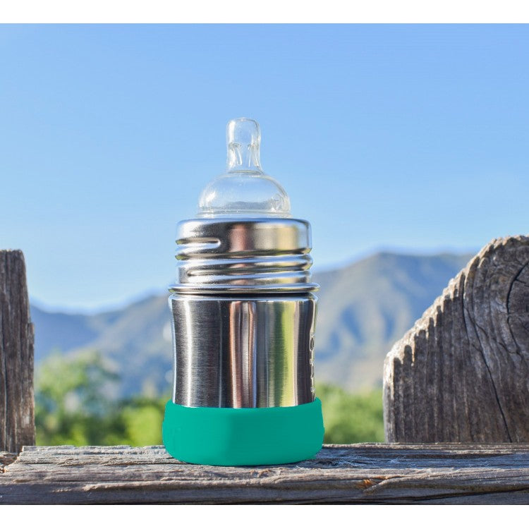 Socle de protection en silicone pour biberon Pura